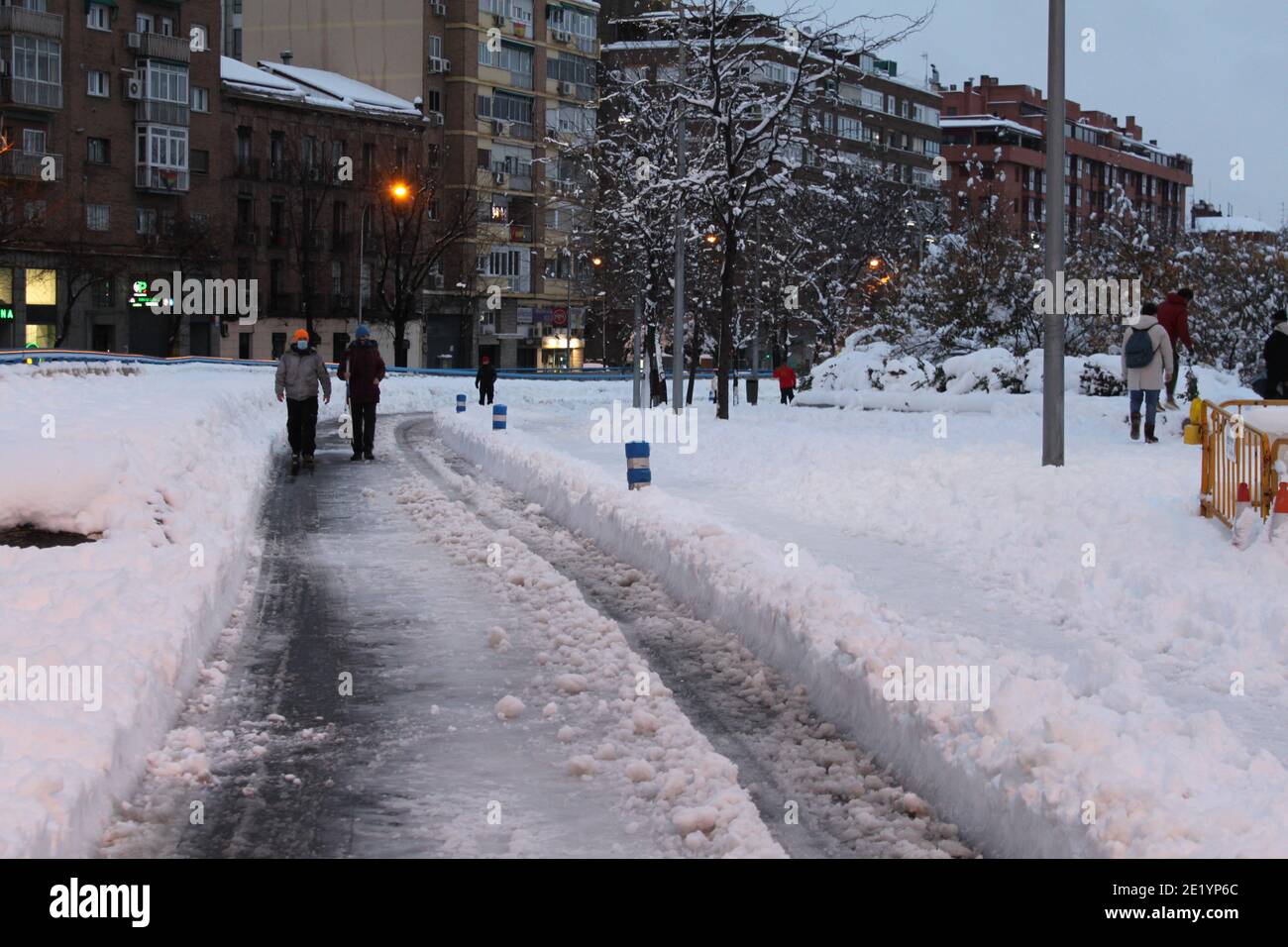 The storm `Filomena` covered the roads, sidewalks and buildings of Madrid Spain with a white blanket of snow in January 2021. /ANA BORNAY Stock Photo